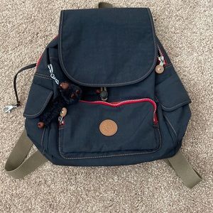 Kipling navy backpack. New